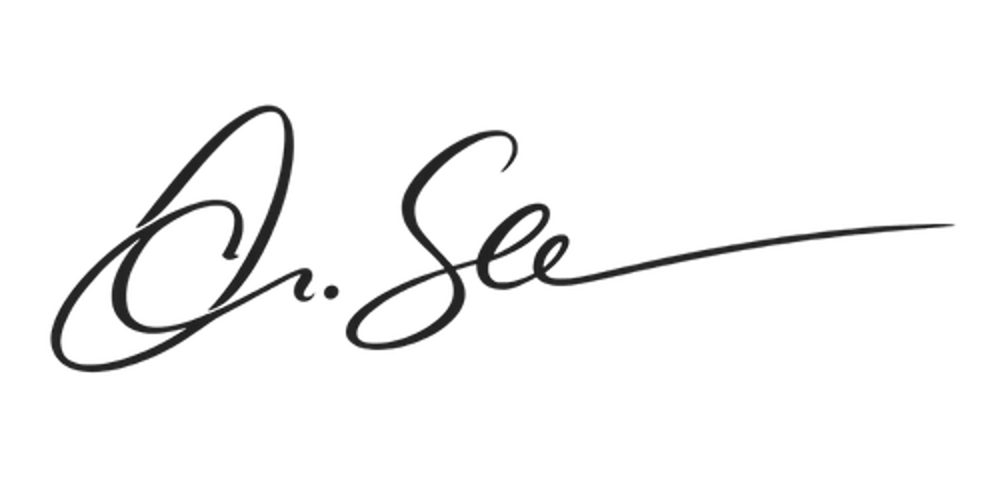 Unterschrift in schwarzer Handschrift auf grünem Hintergrund: "Lara Croft"